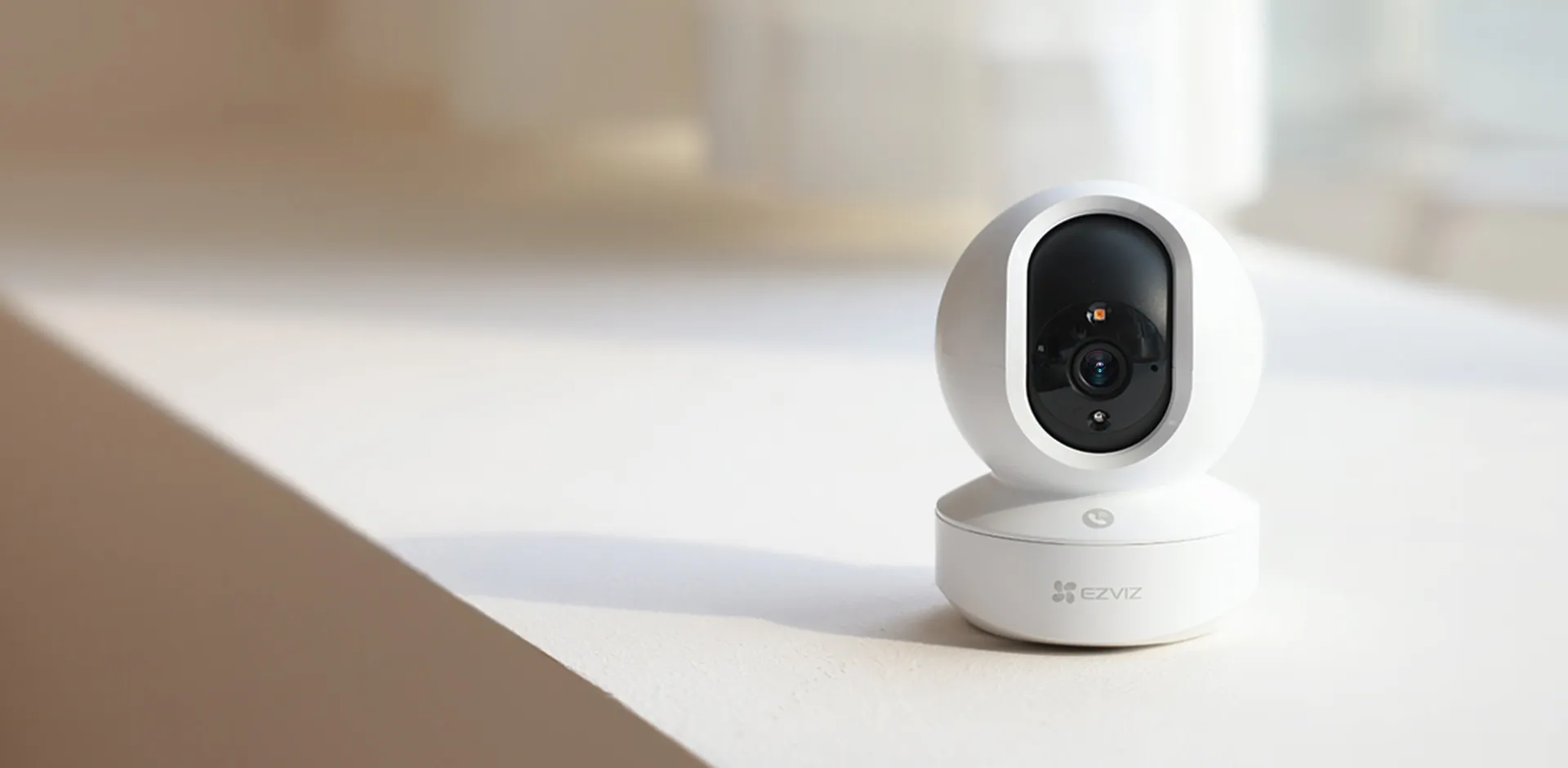 EZVIZ TY1 Pro 2K pan and tilt smart home Wi-Fi camera on a windowsill