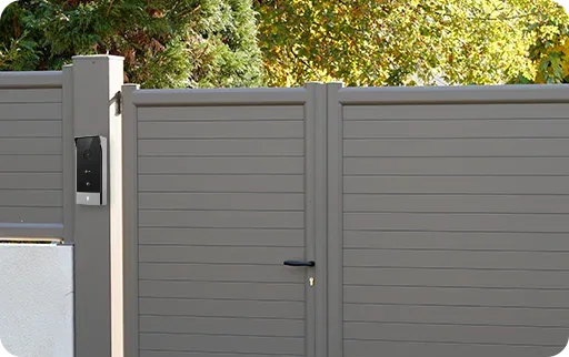 Slim EZVIZ HP5 outdoor panel on a gate post