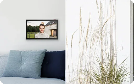 EZVIZ HP5 indoor monitor on a living room wall