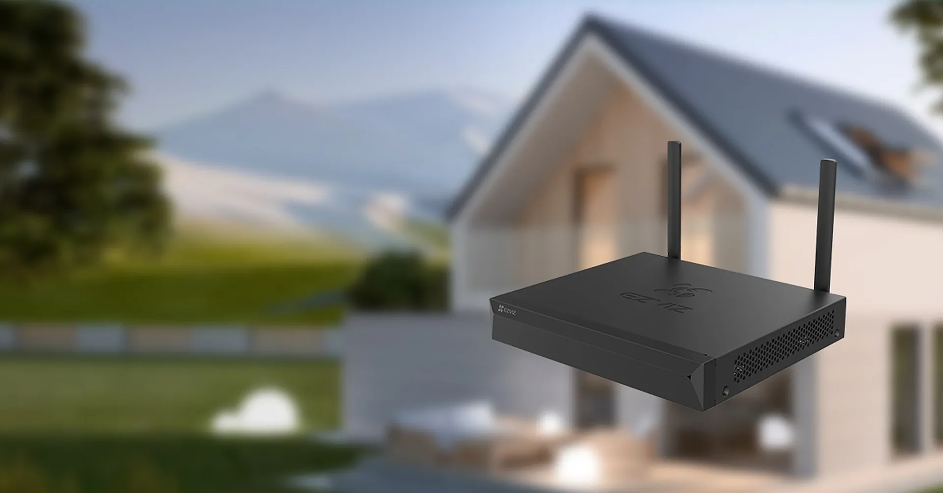 EZVIZ X5S wireless NVR with HDMI and VGA outputs in front of a modern house