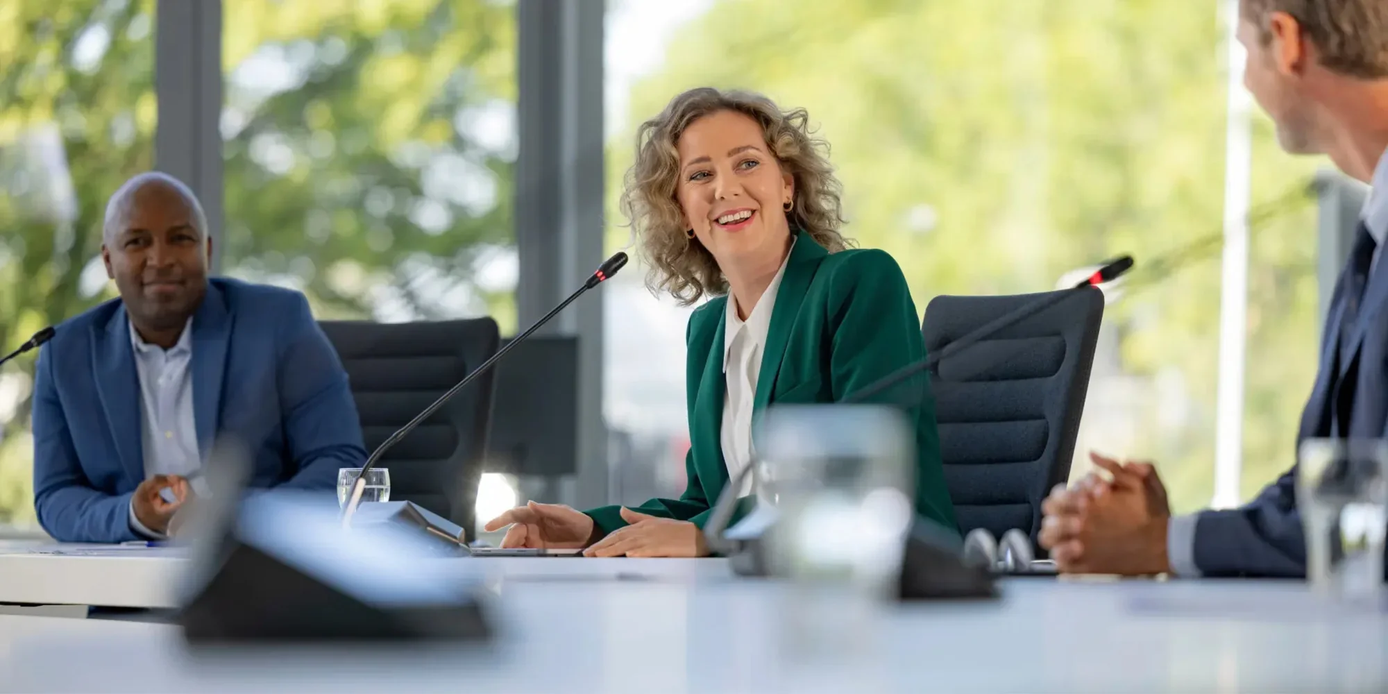 Bosch DICENTIS discussion devices with high directive microphones in a meeting room